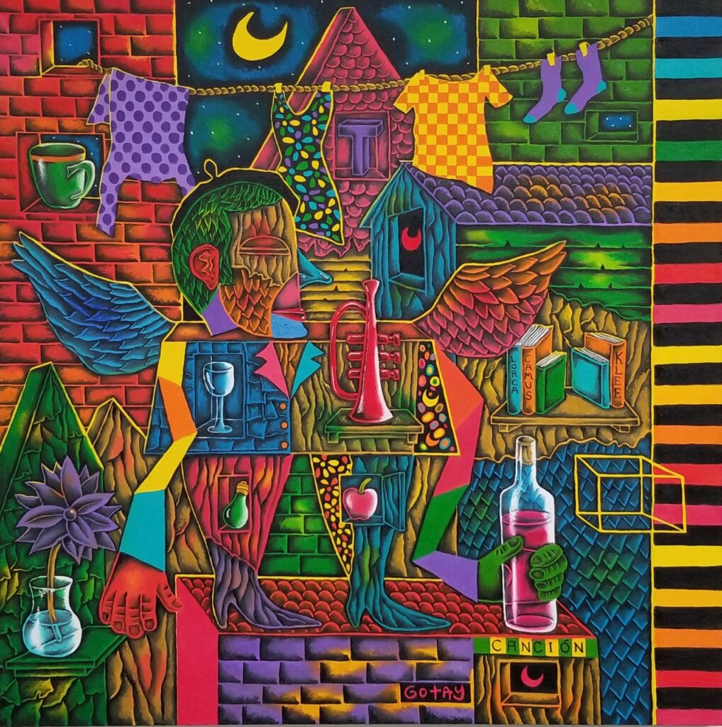 Gabriel with a bottle of red jazz